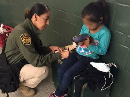 Border Patrol agents rescue a five-year-old girl after human smugglers abandoned her in a dangerous section of the California-Mexico border. (U.S. Border Patrol/San Diego Sector)