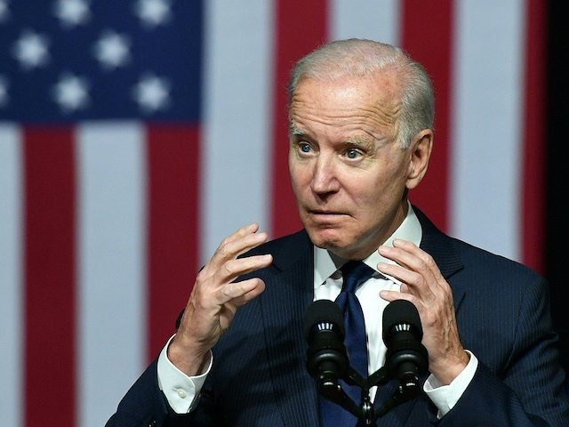 Green - US President Joe Biden speaks during a commemoration of the 100th anniversary of t