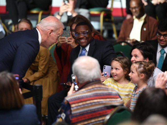 US President Joe Biden talks with children before delivering remarks to commemorate the 100th anniversary of the Tulsa Race Massacre at the Greenwood Cultural Center in Tulsa, Oklahoma on June 1, 2021. - US President Joe Biden traveled Tuesday to Oklahoma to honor the victims of a 1921 racial massacre …