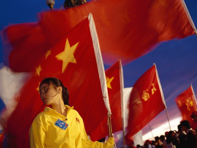 Spectators and participants fill Tiananmen Square during 50th anniversary celebration for