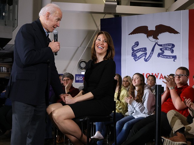 ANKENY, IOWA - JANUARY 25: Democratic presidential candidate former Vice President Joe Biden (L) is joined by Rep. Cindy Axne (D-IA) during a town hall meeting inside the John Deere Exhibition Hall at the FFA Enrichment Center January 25, 2020 in Ankeny, Iowa. While three of the top-polling Democratic presidential candidates are U.S. Senators and must be in Washington for the impeachment trial of President Donald Trump, Biden continues to campaign across Iowa ahead of its all-important February 03 caucuses. (Photo by Chip Somodevilla/Getty Images)