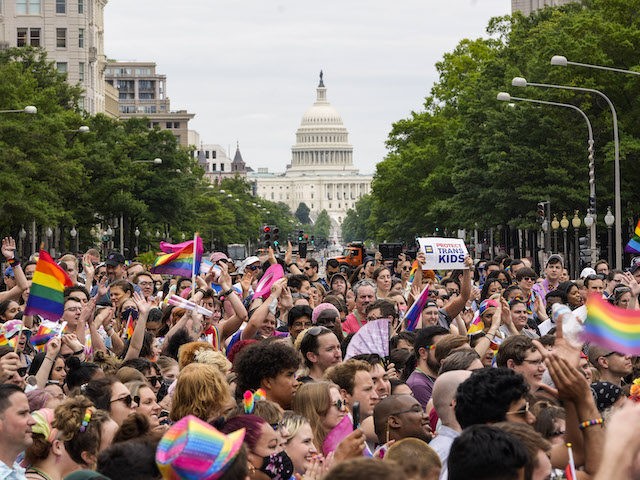 Members and allies of the LGBTQ community participate in the Pride Walk and Rally through downtown Washington, DC on June 12, 2021. The Pride Month celebration is hosted by the Capital Pride Alliance, a non-profit organization serving the needs of the LGBTQ community in Washington, DC. (Photo by Drew Angerer/Getty …