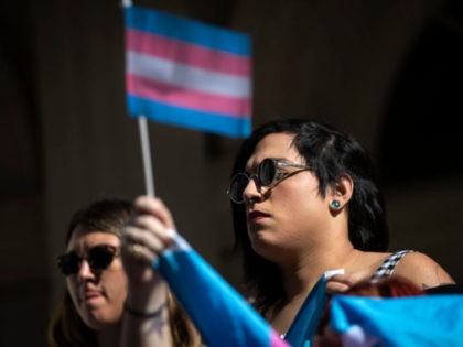 NEW YORK, NY - OCTOBER 24: L.G.B.T. activists and their supporters rally in support of transgender people on the steps of New York City Hall, October 24, 2018 in New York City. The group gathered to speak out against the Trump administration's stance toward transgender people. Last week, The New …