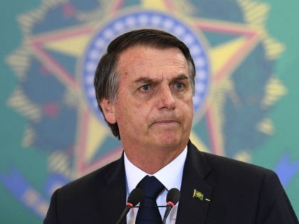 Brazilian President Jair Bolsonaro delivers a speech during the appointment ceremony of the new heads of public banks, at Planalto Palace in Brasilia on January 7, 2019. - Brazil's Finance Minister Paulo Guedes appointed the new presidents of the country's public banks. (Photo by EVARISTO SA / AFP) (Photo credit …