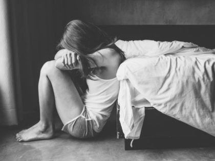 Conceptual of broken hearted, sadness, loneliness woman. Shot with black and white tone.