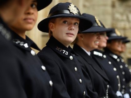 LONDON, ENGLAND - MAY 17: Serving police officers from the Metropolitan Police wear traditional uniforms at Westminster Abbey, ahead of a special service to mark 100 years since women joined the force, on May 17, 2019 in London, England. The Met has been celebrating the history of the role of …