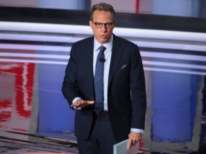 DETROIT, MICHIGAN - JULY 31: CNN moderator Jake Tapper speaks to the crowd attending the Democratic Presidential Debate at the Fox Theatre July 31, 2019 in Detroit, Michigan. 20 Democratic presidential candidates were split into two groups of 10 to take part in the debate sponsored by CNN held over …