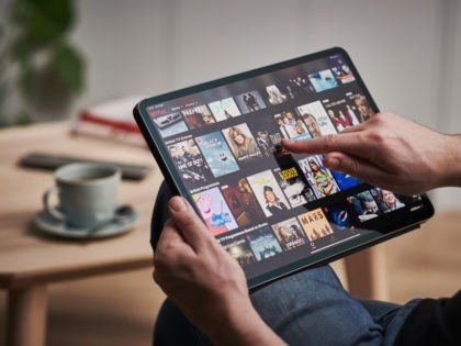 Detail of a mans hand scrolling through Netflix on an Apple iPad Pro, taken on March 6, 2020. (Photo by Phil Barker/Future Publishing via Getty Images)