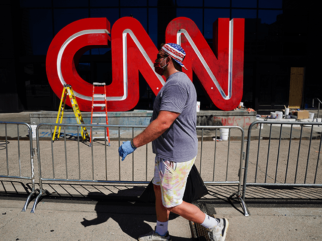 Damage is seen to the CNN logo following an overnight demonstration over the Minneapolis death of George Floyd while in police custody on May 30, 2020 in Atlanta, Georgia. Demonstrations are being held across the U.S. after George Floyd died in police custody on May 25th in Minneapolis, Minnesota. (Photo …