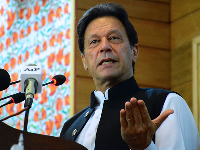 Pakistan's Prime Minister Imran Khan addresses the legislative assembly in Muzaffarabad, the capital of Pakistan-controlled Kashmir on August 5, 2020, to mark the one-year anniversary after New Delhi imposed direct rule on Indian-administered Kashmir. - Pakistani Prime Minister Imran Khan on August 5 branded India an "oppressor and aggressor" a year after New Delhi imposed direct rule on Indian-administered Kashmir. (Photo by - / AFP) (Photo by -/AFP via Getty Images)