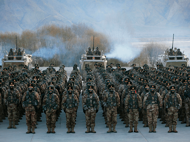 This photo taken on January 4, 2021 shows Chinese People's Liberation Army (PLA) soldiers assembling during military training at Pamir Mountains in Kashgar, northwestern China's Xinjiang region. (Photo by STR / AFP) / China OUT (Photo by STR/AFP via Getty Images)