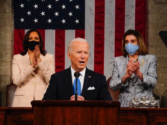 WASHINGTON, DC - APRIL 28: President Joe Biden addresses a joint session of Congress, with Vice President Kamala Harris and House Speaker Nancy Pelosi (D-CA) on the dais behind him on April 28, 2021 in Washington, DC. On the eve of his 100th day in office, Biden spoke about his …