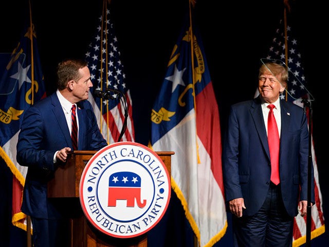Former President Trump Addresses The North Carolina GOP Convention GREENVILLE, NC - JUNE 05: Former U.S. President Donald Trump listens to Ted Budd announce he's running for the NC Senate at the NCGOP state convention on June 5, 2021 in Greenville, North Carolina. The event is one of former U.S. President Donald Trumps first high-profile public appearances since leaving …