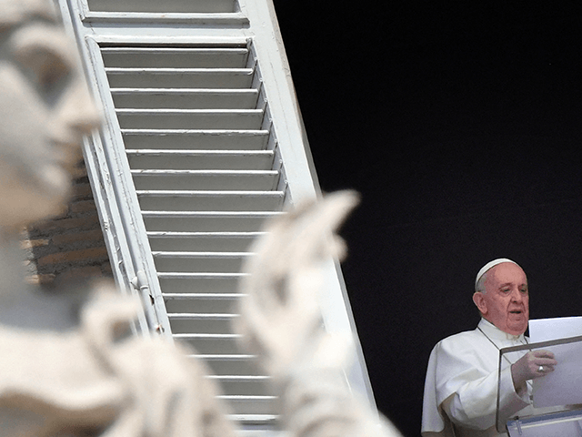 Pope Francis addresses the crowd from the window of the apostolic palace overlooking St.Peter's square during his Sunday Angelus prayer at the Vatican on June 13, 2021. (Photo by Alberto PIZZOLI / AFP) (Photo by ALBERTO PIZZOLI/AFP via Getty Images)