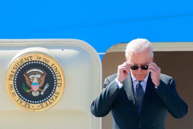 US President Joe Biden steps off Air Force One as he arrives at Cointrin airport in Geneva