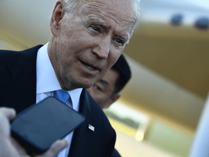 US President Joe Biden speaks with press, preparing departing the airport, after the US-Ru