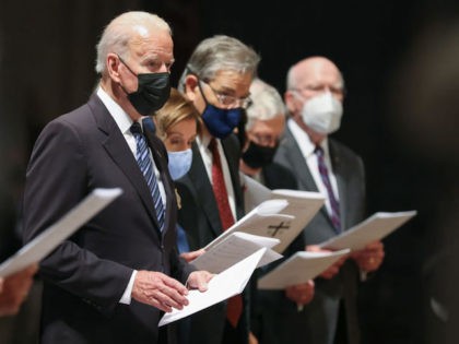 President Joe Biden attends the funeral ceremony of Senator John Warner at Washington Nati