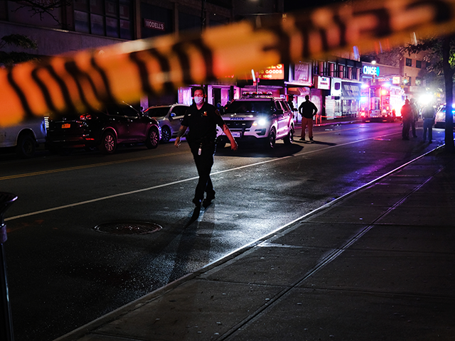 Police gather at the scene where two New York City police officers were shot in a confrontation late Wednesday evening in Brooklyn on June 03, 2020 in New York City. The officers were hit by gunfire in the Flatbush section of Brooklyn just before midnight and no details have yet …