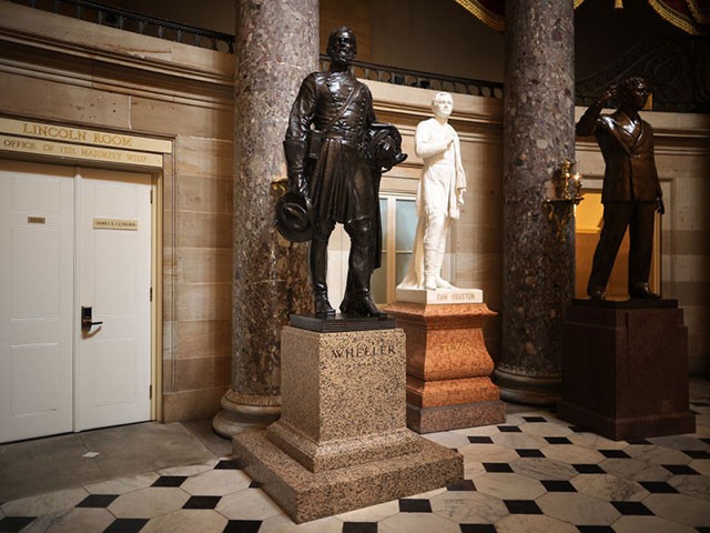 WASHINGTON, DC - JUNE 18: A statue of Joseph Wheeler (C), a cavalry general in the Confederate States Army during the Civil War and member of the House of Representatives, stands on a pedestal outside the office door of House Majority Whip James Clyburn (D-SC) in Statuary Hall inside the U.S. Capitol June 18, 2020 in Washington, DC. Speaker of the House Nancy Pelosi (D-CA) has requested that Congress remove this statue and 10 others of Confederate soldiers and officials from the U.S. Capitol "The statues in the Capitol should embody our highest ideals as Americans, expressing who we are and who we aspire to be as a nation. Monuments to men who advocated cruelty and barbarism to achieve such a plainly racist end are a grotesque affront to these ideals. Their statues pay homage to hate, not heritage. They must be removed," Pelosi wrote in the letter addressed to committee Chair Roy Blunt (R-MO) and Vice Chair Zoe Lofgren (D-CA). (Photo by Chip Somodevilla/Getty Images)