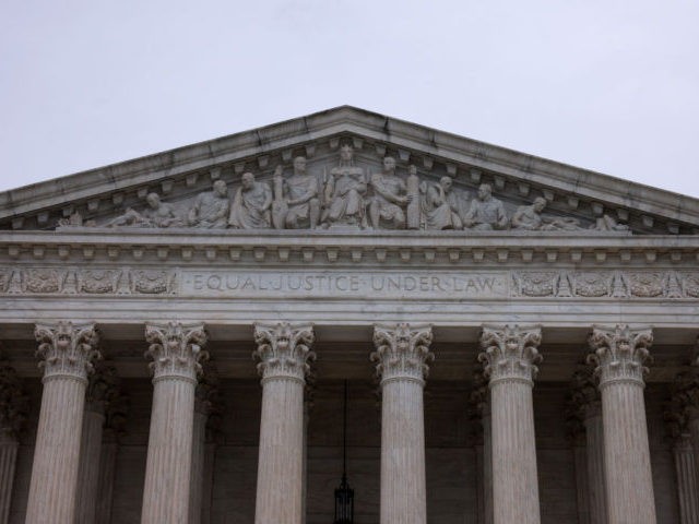 WASHINGTON, DC - MAY 24: Rain clouds hang above the The U.S. Supreme Court building May 24, 2021 in Washington, DC. The court, which is still meeting remotely due to COVID-19, handed down opinions in two cases, Guam v. United States and United States. v. Palomar-Santiago. (Photo by Anna Moneymaker/Getty …
