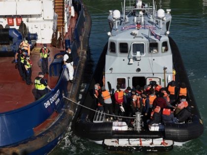 DOVER, ENGLAND - JUNE 09: A border force vessel carries newly arrived migrants after being picked up in a dinghy in the English Channel on June 09, 2021 in Dover, England. More than 500 migrants arrived in the final week of May, according to the UK Home Office, adding that …