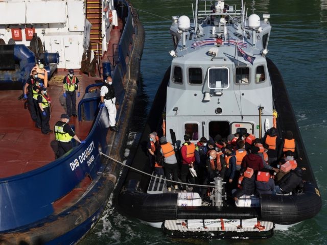 DOVER, ENGLAND - JUNE 09: A border force vessel carries newly arrived migrants after being