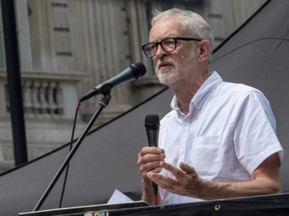 LONDON, ENGLAND - JUNE 12: (EDITOR'S NOTE: Alternative crop #1233413604) Former leader of the Labour Party, Jeremy Corbyn, addresses demonstrators gathered for a Justice for Palestine protest outside Downing Street on June 12, 2021 in London, England. In May 2021 Israel launched an 11-day aerial bombardment of Gaza, killing 248, …