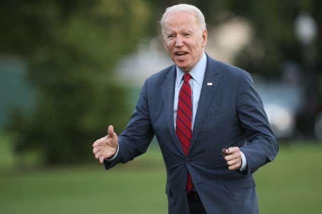 WASHINGTON, DC - JUNE 24: U.S. President Joe Biden gestures to reporters as he returns to