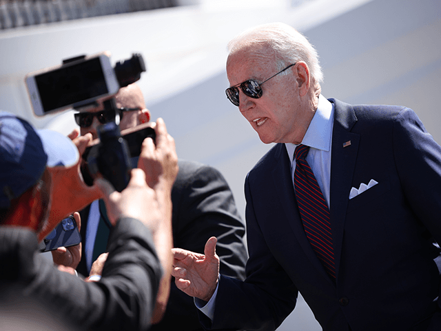 U.S. President Joe Biden talks with reporters while departing the White House June 29, 202