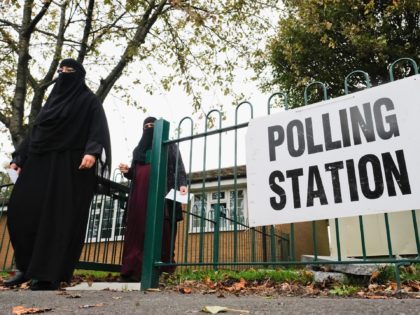 BATLEY, ENGLAND - OCTOBER 20: Voters head to the polls during the Batley and Spen by-election on October 20, 2016 in Batley, United Kingdom. The by-election in the Batley and Spen constituency was prompted by the death of Labour MP Jo Cox, who was shot and stabbed in Birstall, West …