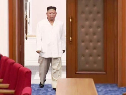 Image: KCTV, June 22, 2021 (edited by NK News) | Kim Jong Un walking into a recent concert by the Band of the State Affairs Commission