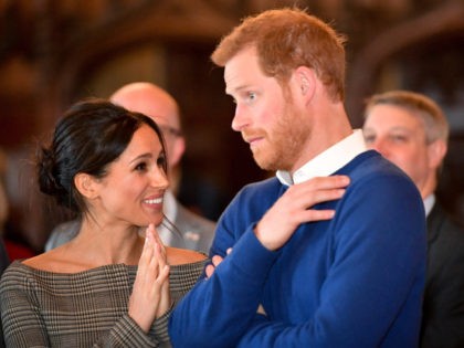 CARDIFF, WALES - JANUARY 18: Prince Harry and Meghan Markle watch a dance performance by Jukebox Collective in the banqueting hall during a visit to Cardiff Castle on January 18, 2018 in Cardiff, Wales. (Photo by Ben Birchall - WPA Pool / Getty Images)