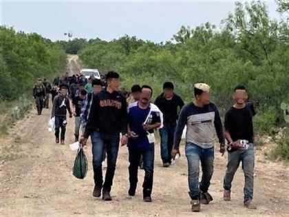 Uvalde Station Border Patrol agents apprehend a large group of migrants in May. (Photo: U.S. Border Patrol/Del Rio Sector)
