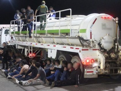 Border Patrol agents arrest a group of migrants locked inside a tanker trailer. (Photo: U.S. Border Patrol/Laredo Sector)
