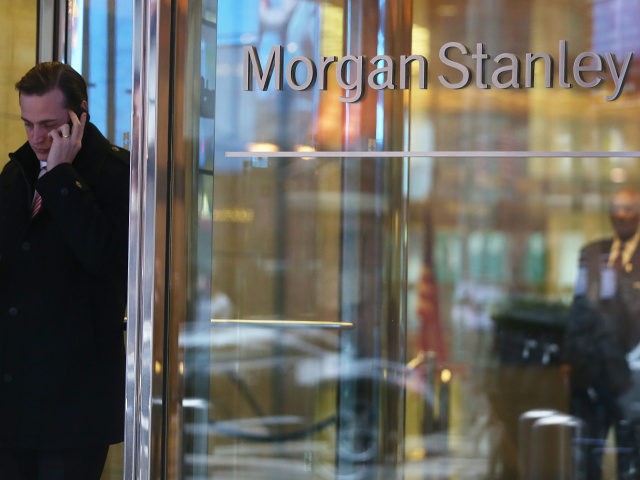 NEW YORK, NY - JANUARY 09: A man walks out of Morgan Stanley headquarters in Manhattan on January 9, 2013 in New York City. Morgan Stanley announced plans to cut 1,600 jobs, or 6 percent of its workforce, due to "market conditions". (Photo by Mario Tama/Getty Images)