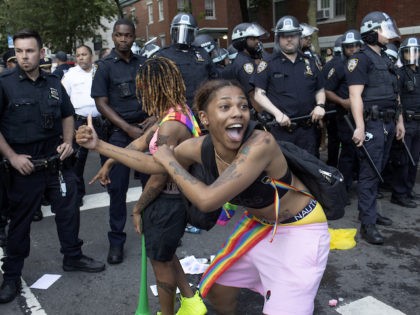 NEW YORK, NEW YORK - JUNE 27: Police clash with revelers during Gay Pride festivities after trying to clear a street on the edge of Washington Square Park on June 27, 2021, in the Greenwich Village neighborhood of New York City. The Queer Liberation March, which replaced the traditional Gay …