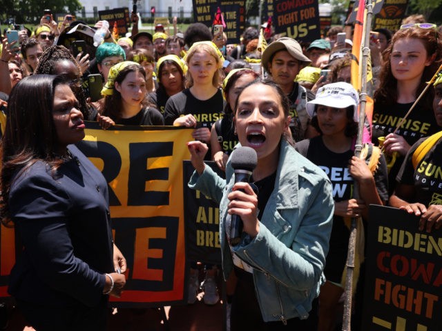 WASHINGTON, DC - JUNE 28: Rep. Cori Bush (D-MO) (L) and Rep. Alexandria Ocasio-Cortez (D-N