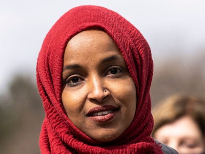 Rep. Ilhan Omar (C) (D-MN) speaks during a press conference at a memorial site for Daunte
