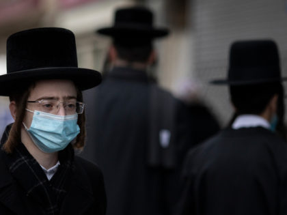 LONDON, ENGLAND - FEBRUARY 25: Members of the Orthodox Jewish community in Stamford Hill, ahead of Purim on February 25, 2021 in London, England. Last year's Purim occurred before the first Coronavirus lockdown came into force. This year the celebration will be scaled back significantly, with Rabbis asking that, among …