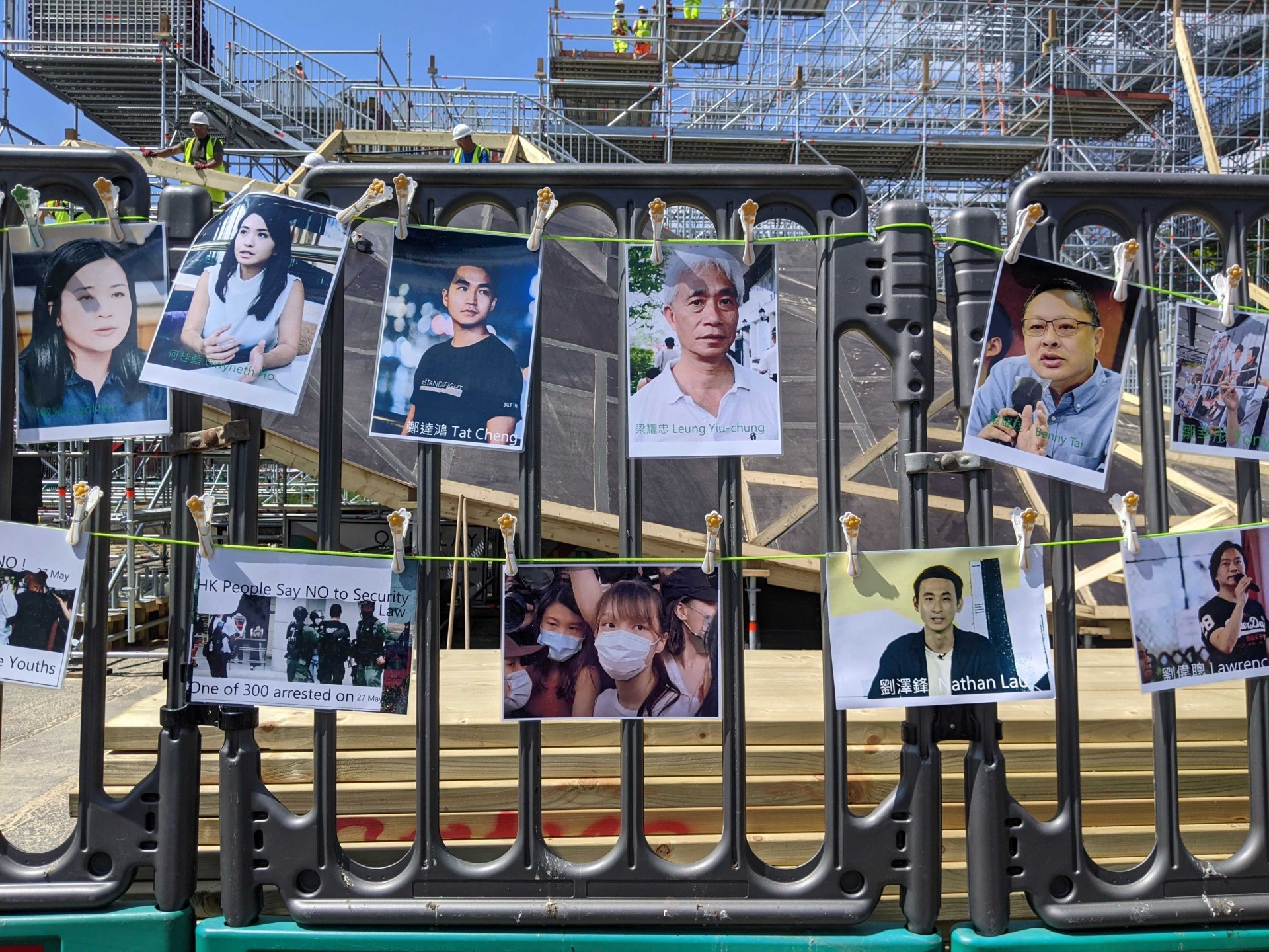 Hong Kong protesters hung pictures of pro-democracy activists who have been targeted by the Chinese Communist Party at a demonstration in London. June 12th, 2021. Kurt Zindulka, Breitbart News