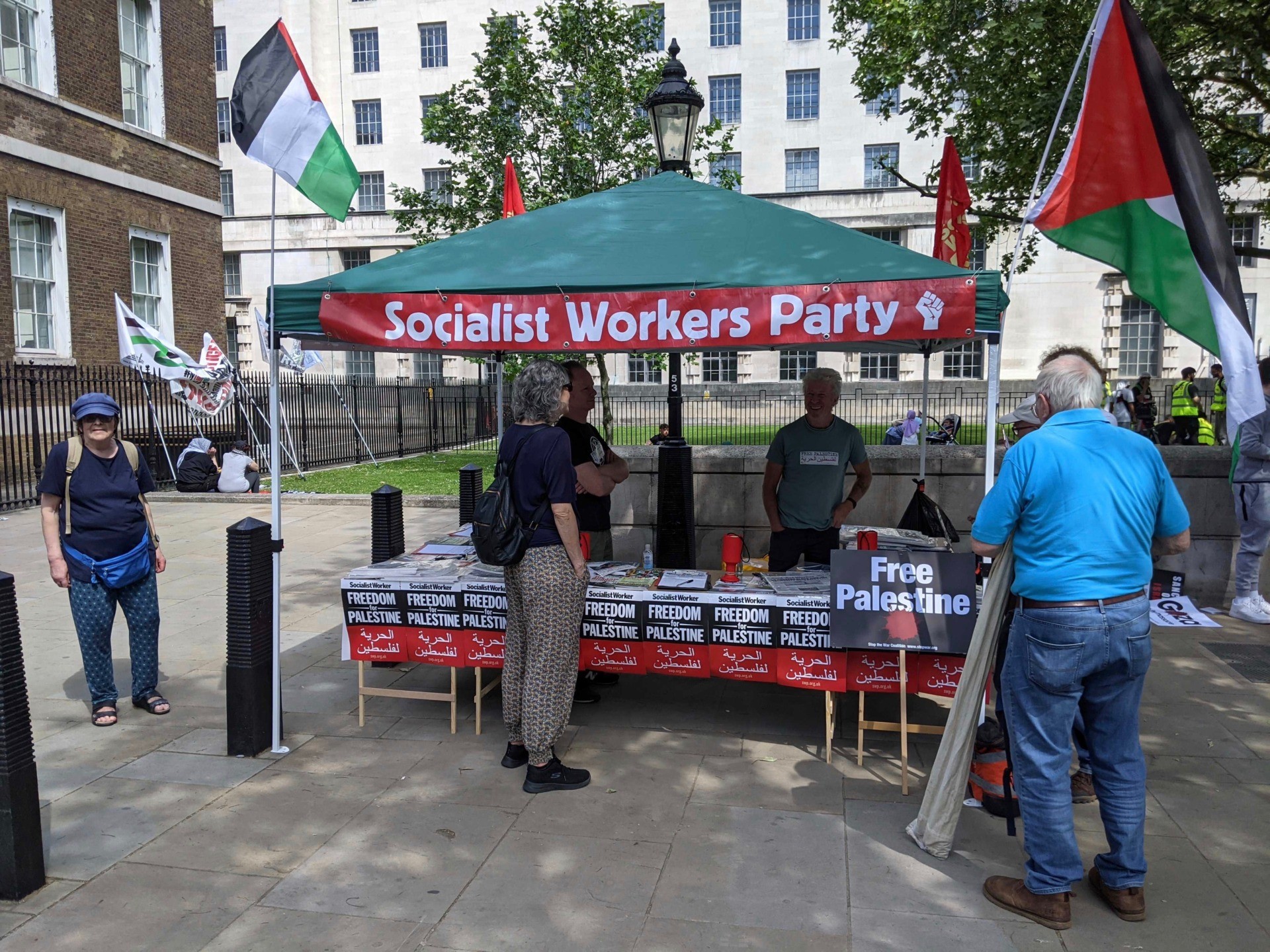 The Socialist Workers Party attended the Downing Street protest against Israel, handing out placards and propaganda. June 12th, 2021. Kurt Zindulka, Breitbart News