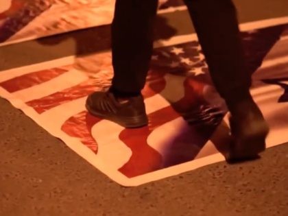 Palestinian trampling U.S. flag (Palestinian Authority Ministry of Culture)