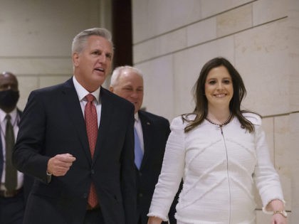 House Minority Leader Kevin McCarthy, R-Calif., left, walks with Rep. Elise Stefanik, R-N.Y., to talk with reporters at the Capitol in Washington, Friday, May 14, 2021, just after she was elected the new chair of the House Republican Conference, replacing Rep. Liz Cheney, R-Wyo., who was ousted from the GOP …