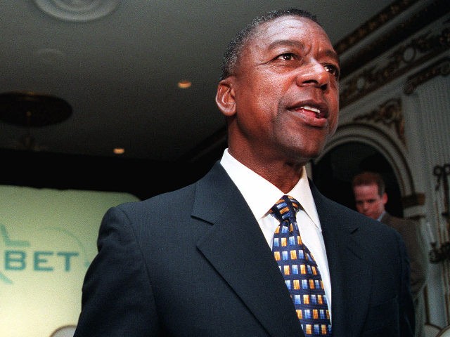 Black Entertainment Television chairman and founder Robert Johnson listens to a guestion after a news conference Thursday, August 12, 1999, in New York. Johnson announced an initiative led by BET Holdings, with cooperation from the NAACP and the United Negro College Fund and a group of top media companies, in …