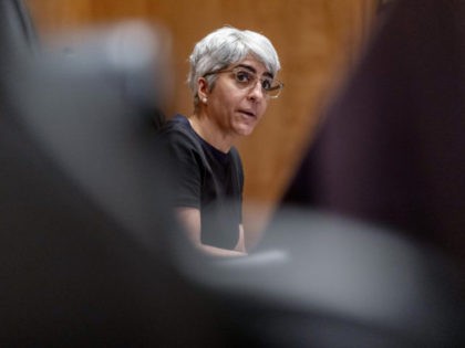 Kiran Ahuja, the nominee to be Office of Personnel Management Director, speaks at a Senate Governmental Affairs Committee hybrid nominations hearing on Capitol Hill, Thursday, April 22, 2021, in Washington. (AP Photo/Andrew Harnik)