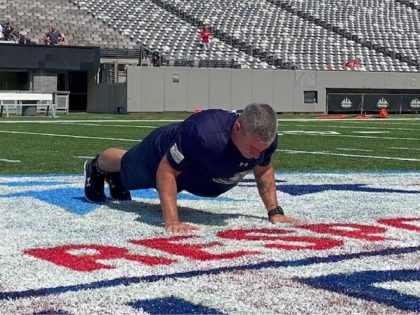 "Ambassador Nate Carroll officially breaks the @GWR push-up record in front of a crowd of