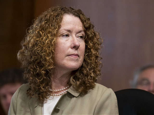 Tracy Stone-Manning listens during a confirmation hearing for her to be the director of th