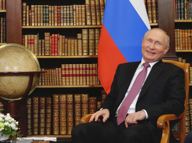 Vladimir Putin globe (Denis Balibouse / Pool / AFP / Getty)