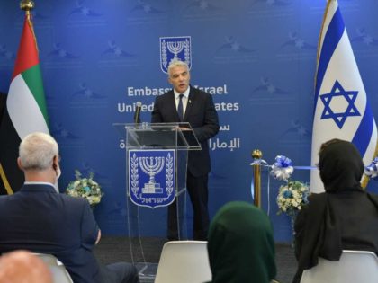 ABU DHABI, UNITED ARAB EMIRATES - JUNE 29: (----EDITORIAL USE ONLY â MANDATORY CREDIT - " ISRAELI FOREIGN MINISTRY / HANDOUT" - NO MARKETING NO ADVERTISING CAMPAIGNS - DISTRIBUTED AS A SERVICE TO CLIENTS----) Israeli Foreign Minister, Yair Lapid (C) speaks at the opening of Israeli Embassy in Abu Dhabi …