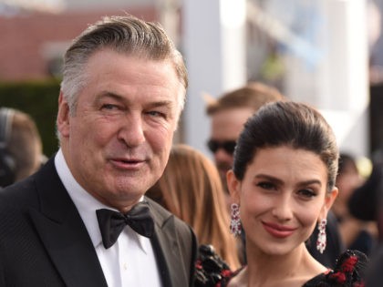 Actor Alec Baldwin (L) and wife Hilaria Baldwin walk the red carpet at the 25th Annual Screen Actors Guild Awards at the Shrine Auditorium in Los Angeles on January 27, 2019. (Photo by Robyn Beck / AFP) (Photo credit should read ROBYN BECK/AFP via Getty Images)